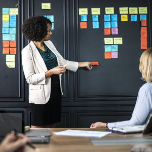 woman organizing post it notes